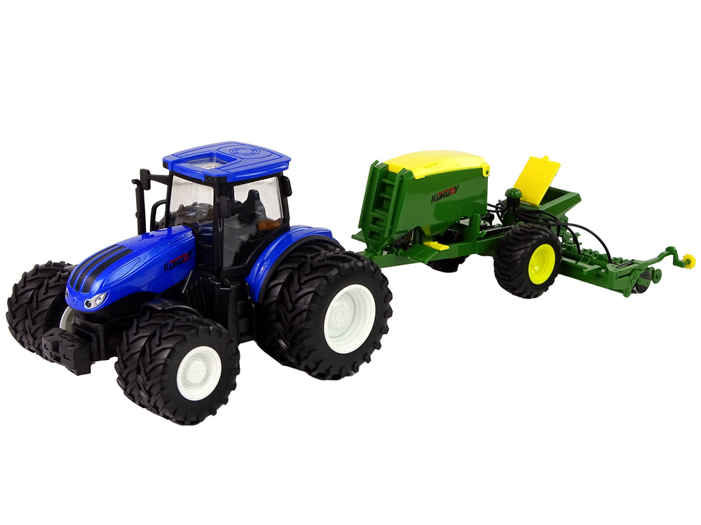 Blue tractor with baler