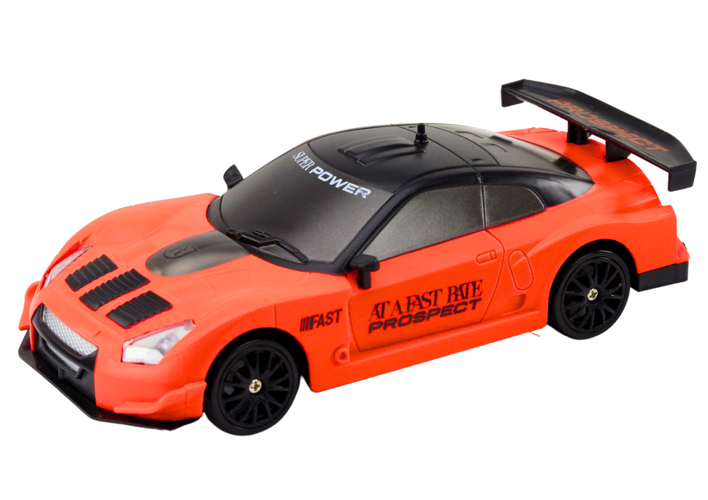 Remote Controlled R/C Sports Car 1:24 Orange Interchangeable Wheels