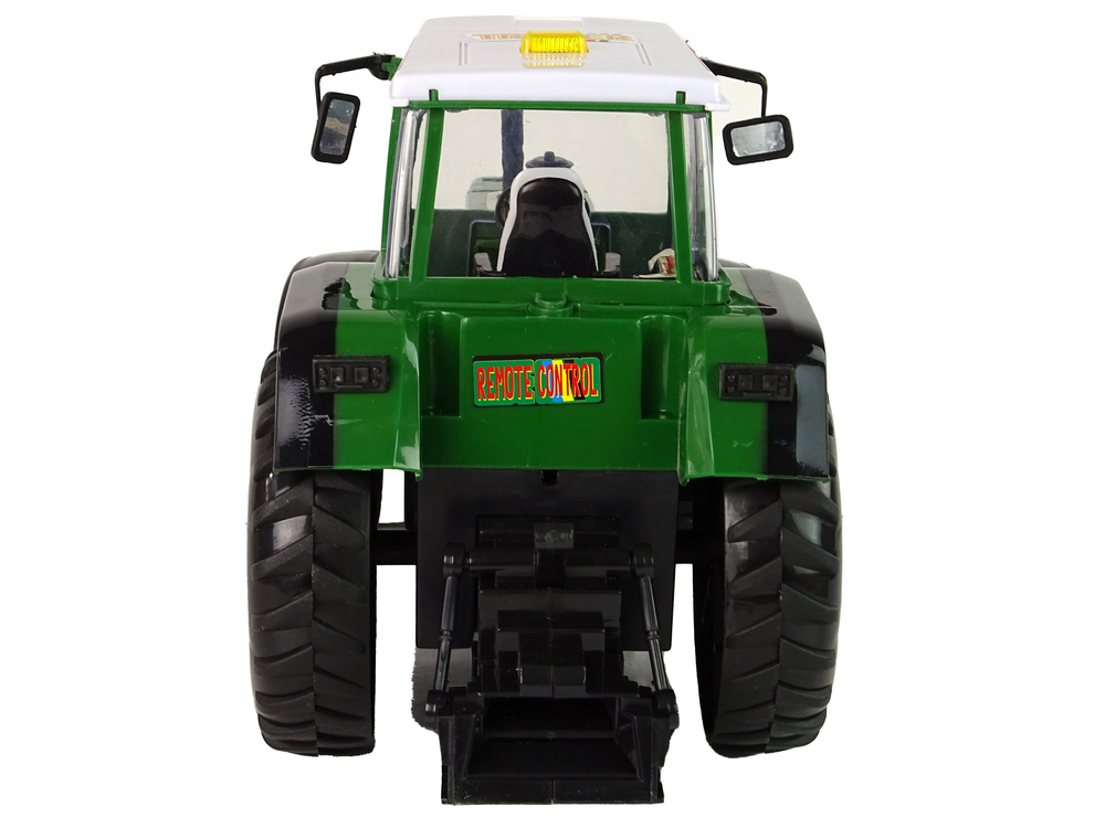 Green and black R/C Remote Controlled Tractor