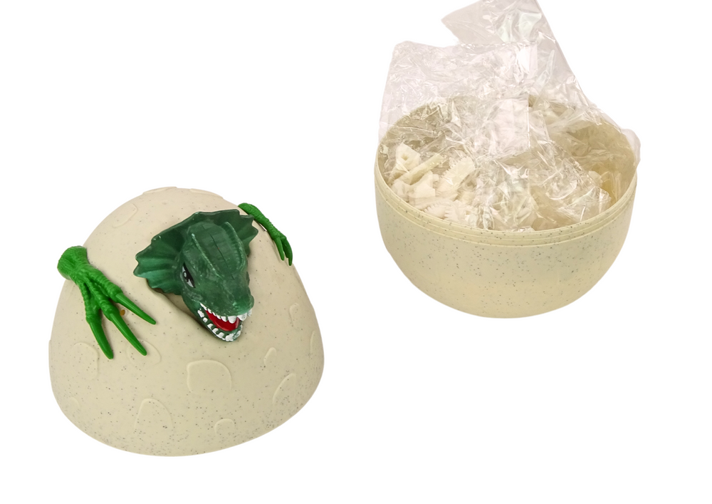 Egg with dinosaurs for painting DIY paint brushes green