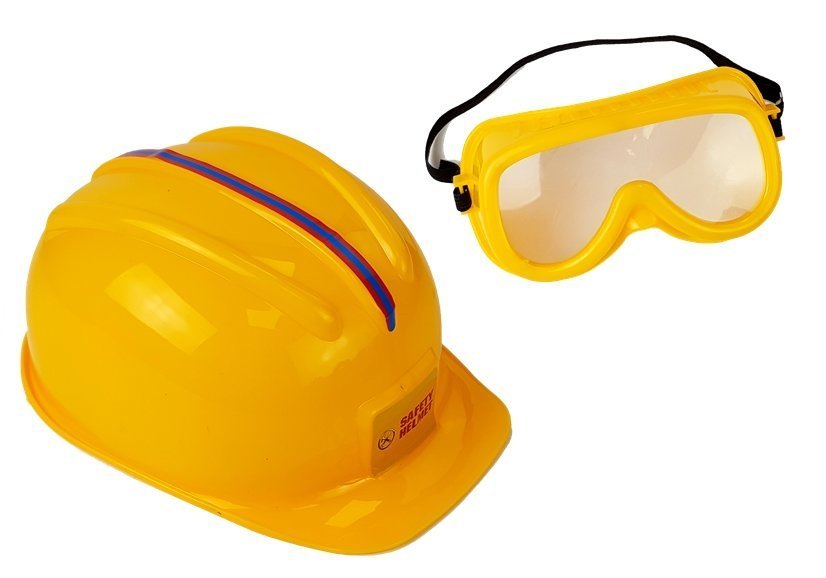 Set of tools, saw with batteries, helmet, gloves and safety glasses